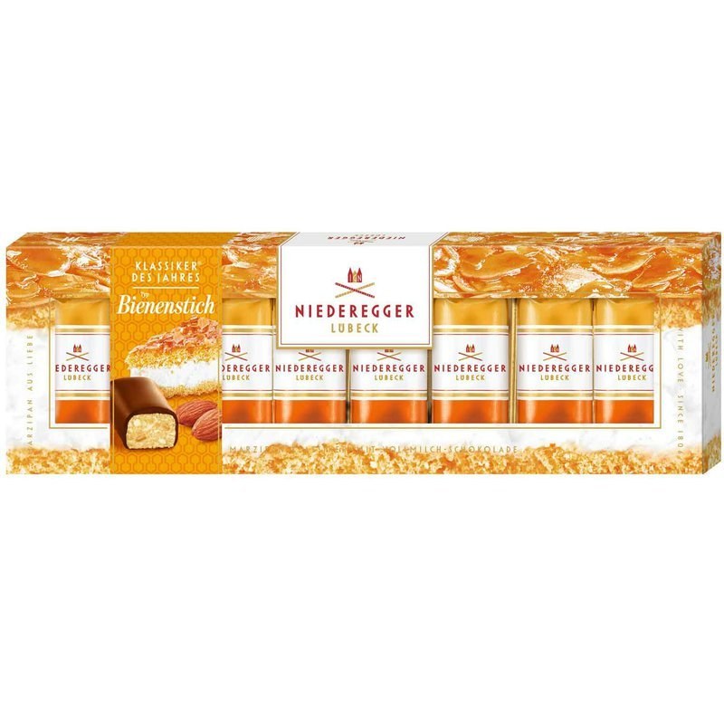 Pralinky marcipánové s příchutí medového dortíku v mléčné čokoládě 100 g Niederegger Bienenstich Pralinky marcipánové s příchutí medového dortíku v mléčné čokoládě 100 g Niederegger Bienenstich - Delikatesy, dárky Čokolády, bonbony, sladkosti